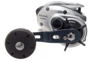 Product Brand Logo If you're serious about winning those epic battles yet to come, put a Shimano® TranX® 300/400 Baitcast Reel in your hands. This is a tank of a reel, built for big baits and big fish, with the strength to subdue almost anything that swims and the durability to keep coming back for more. Its rigid diecast aluminum Hagane body, oversized HEG Gearing, and X-Ship internal support combine for massive cranking power; the advanced Coreprotect sealing system keeps water away from the internals, so every retrieve feels almost effortless. Even with its compact, ergonomic profile, the TranX is fully equipped to win, with a precision aluminum S3D spool; QuickFire II clutch bar; super-efficient 5+1 system with S-ARB stainless steel bearings; proven Variable Braking System; Cross Carbon drag; and rugged CI4+ handle knob or low-gear models have double handles with oversized rubber paddles.